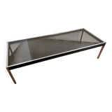 Large designer coffee table from the 70s in chrome, smoked glass, and faux leather.