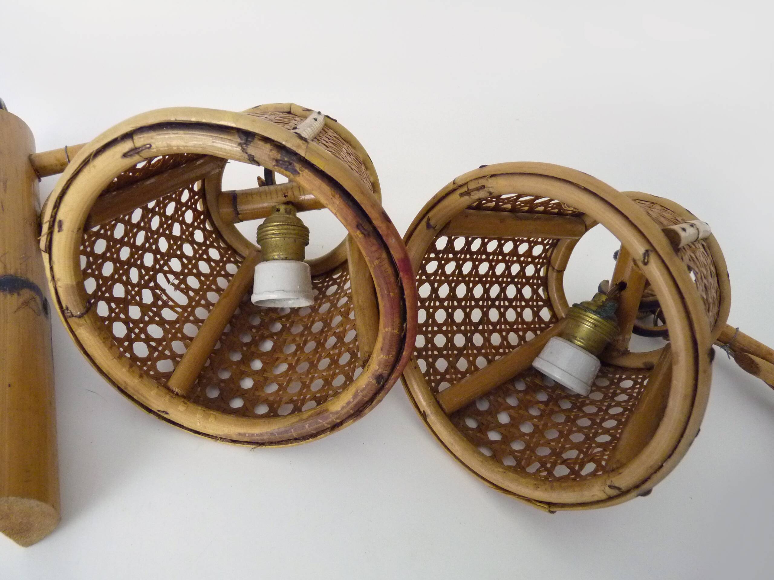 Pair of rattan and cane lantern wall lights. 1950s-1960s