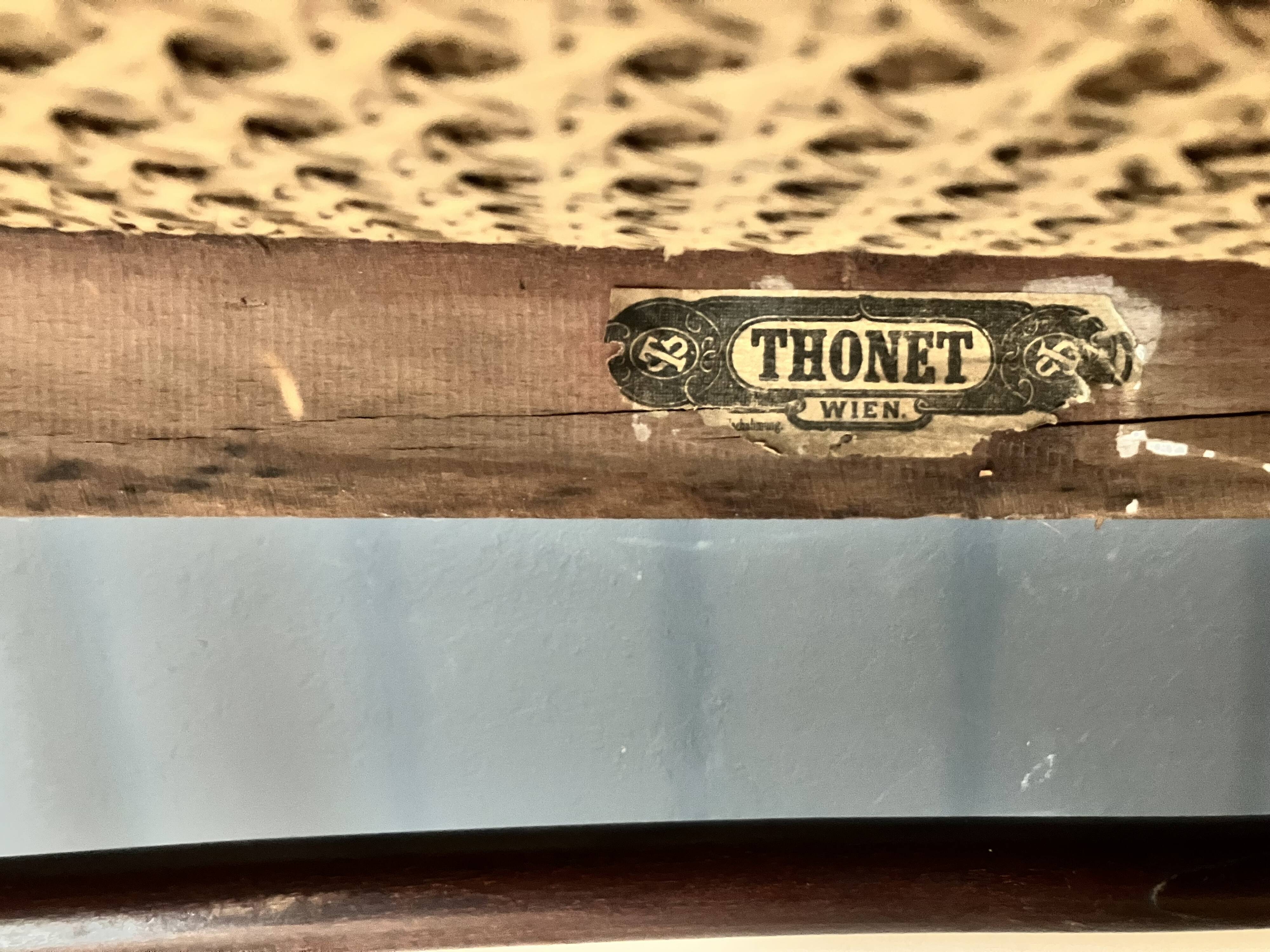 Thonet-branded bistro-style bench in turned wood, velvet and caning