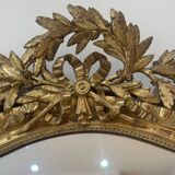 Miroir ancien de style Louis XVI, doré à la feuille