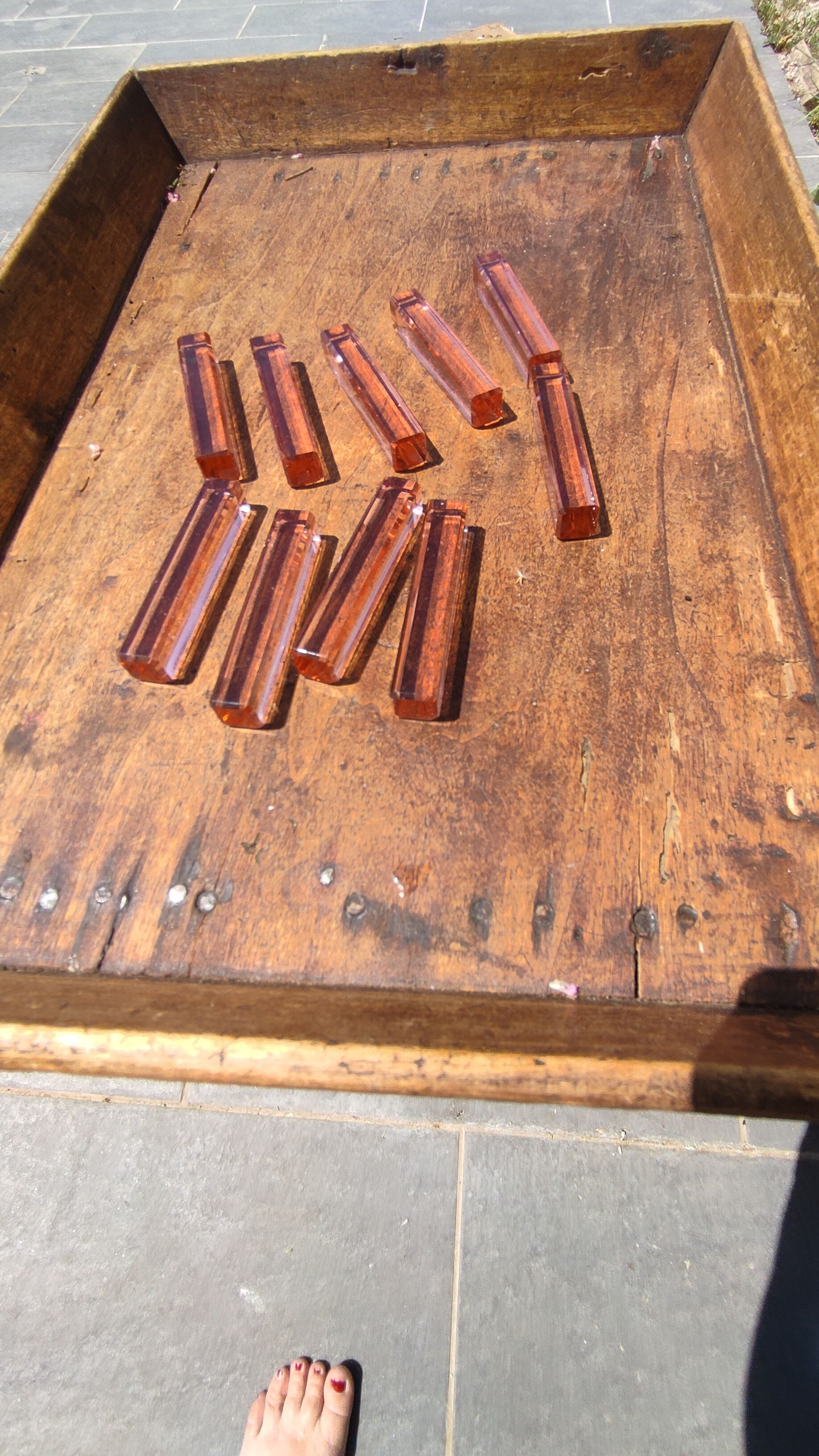 Ten pink glass knife holders