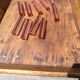 Ten pink glass knife holders