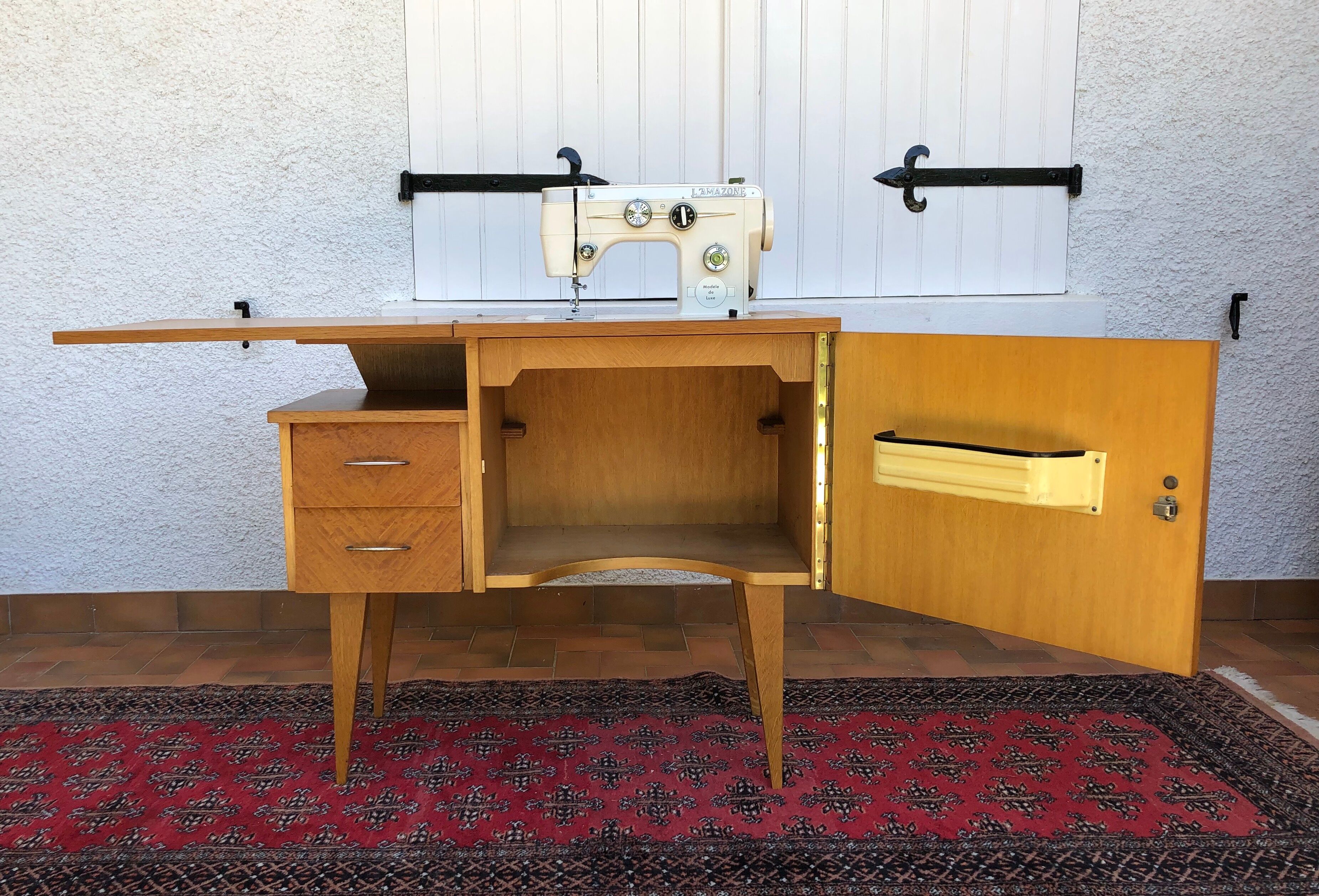 Vintage furniture with sewing machine light wood