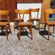 6 vintage 1960s wooden bistro chairs with camel faux leather.