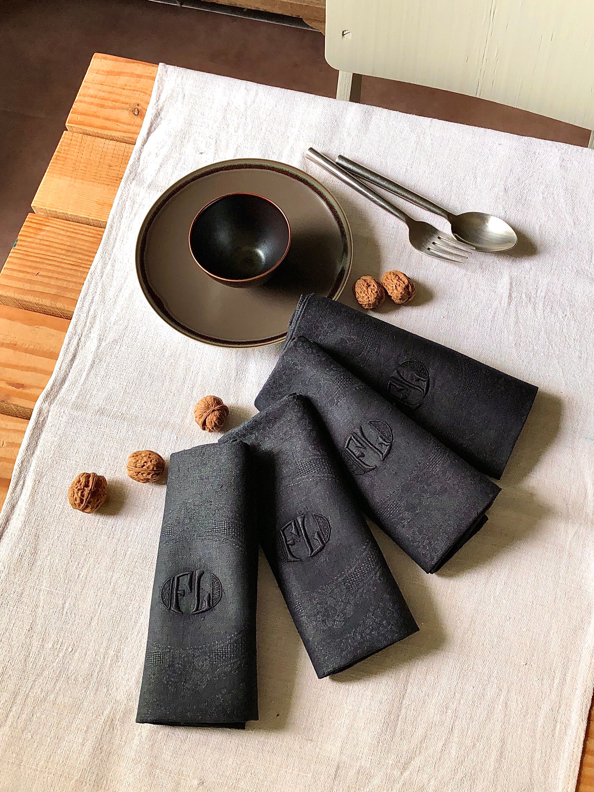 Set of four old damasked towels tinted black
