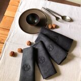 Set of four old damasked towels tinted black