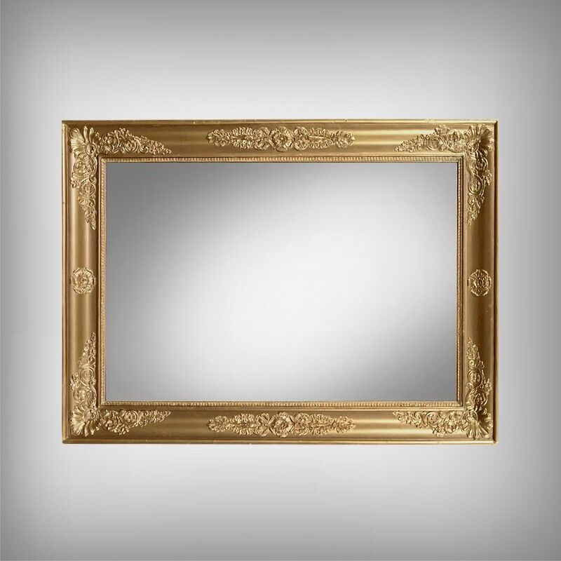 Important miroir en bois doré, style Restauration – Milieu XIXe