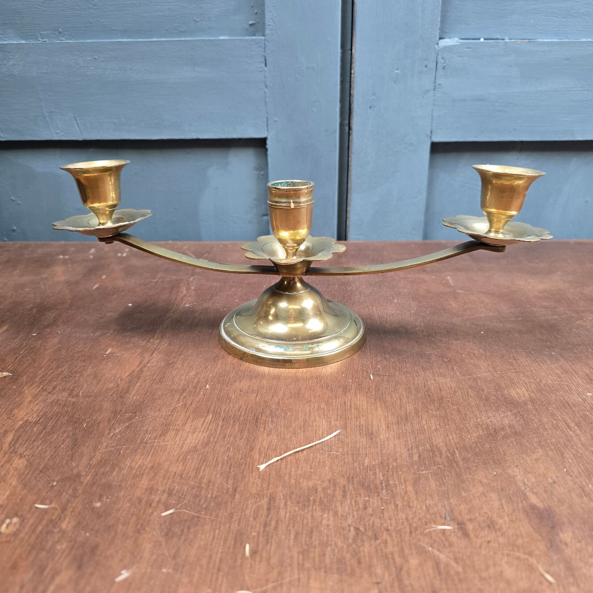 Vintage brass candle holder with 3 lights, flower drip trays, ideal for a centrepiece.