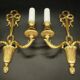 Pair of Louis XVI style knot wall lights - gilded bronze
