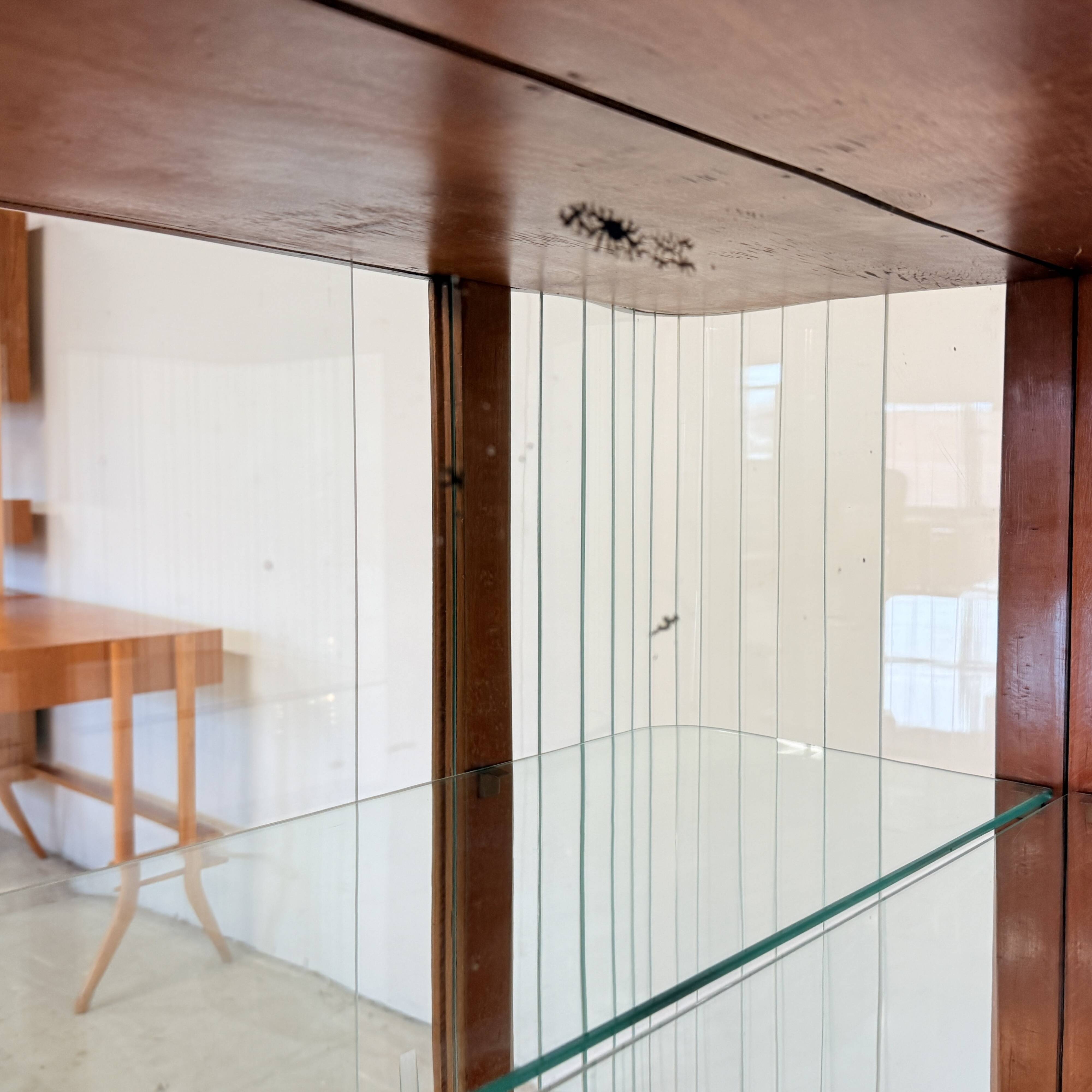 Elegant, curved display cabinet in Art Deco style