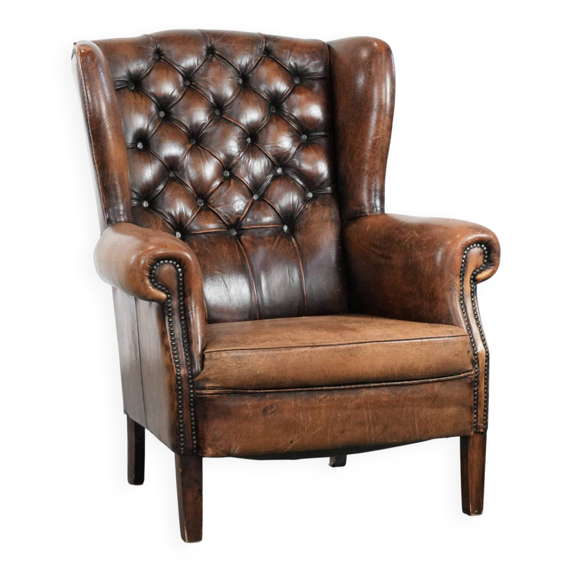 Unique large sheepskin Chesterfield wingback armchair in English style