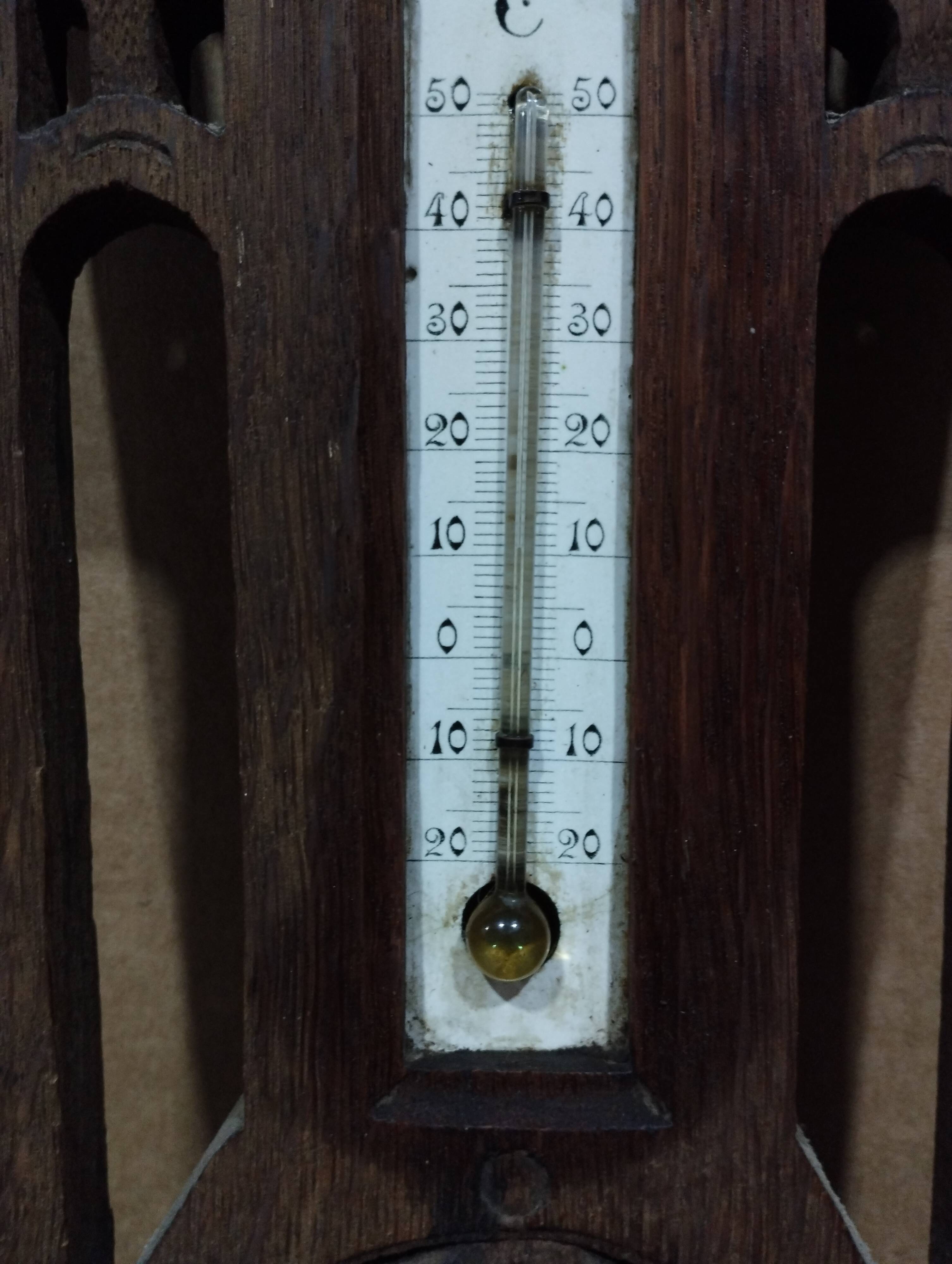 Old barometer and thermometer from the 1930s in carved wood. Signed on the back EH PARIS.