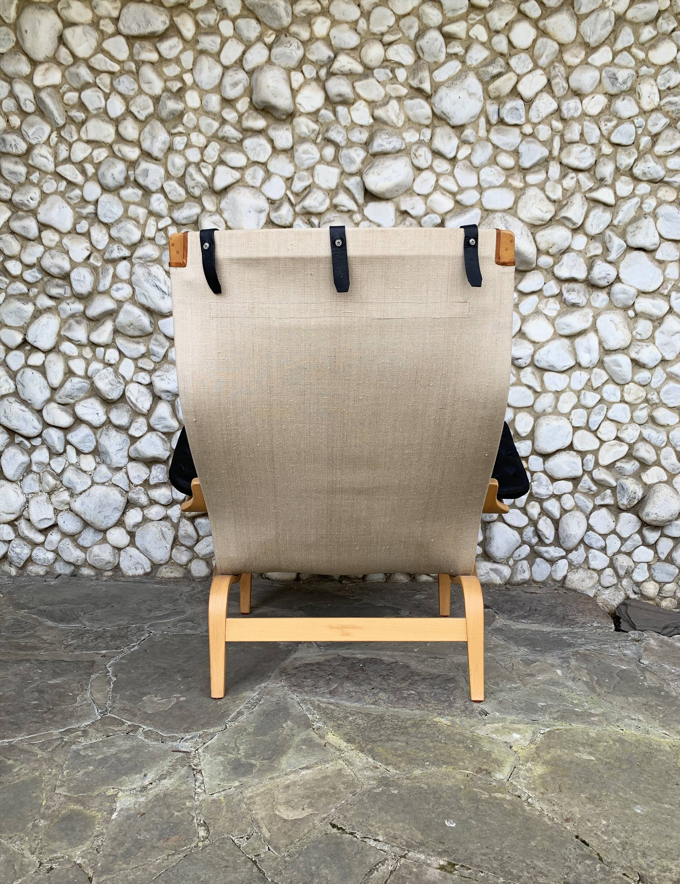 Pernilla armchair new black leather by Bruno Mathsson, Dux, Sweden 1970