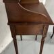Old-fashioned secretary desk and chair set.