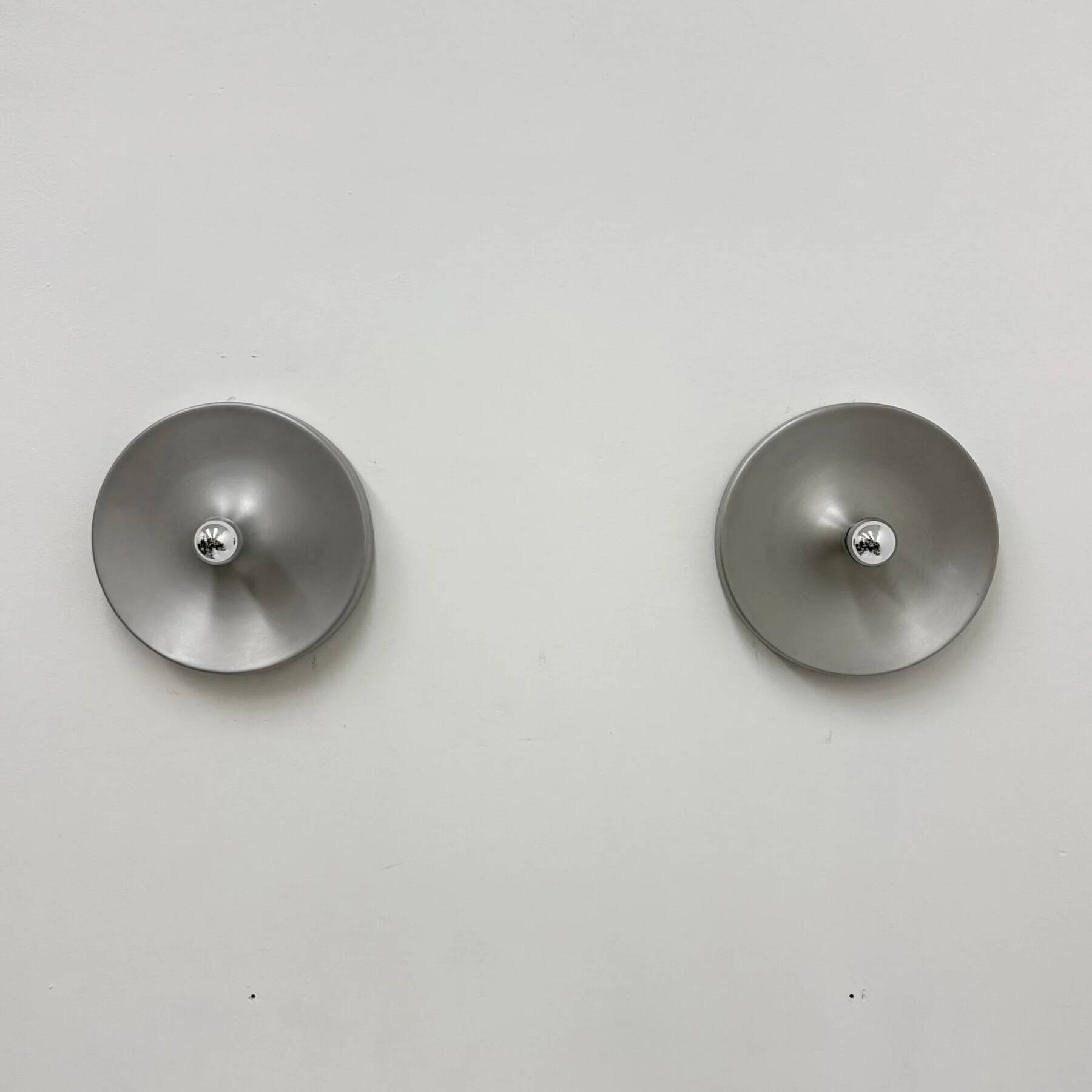 Mid-century design disc lamp, 1970s attributed to Charlotte Perriand for Les Arcs, set of 2