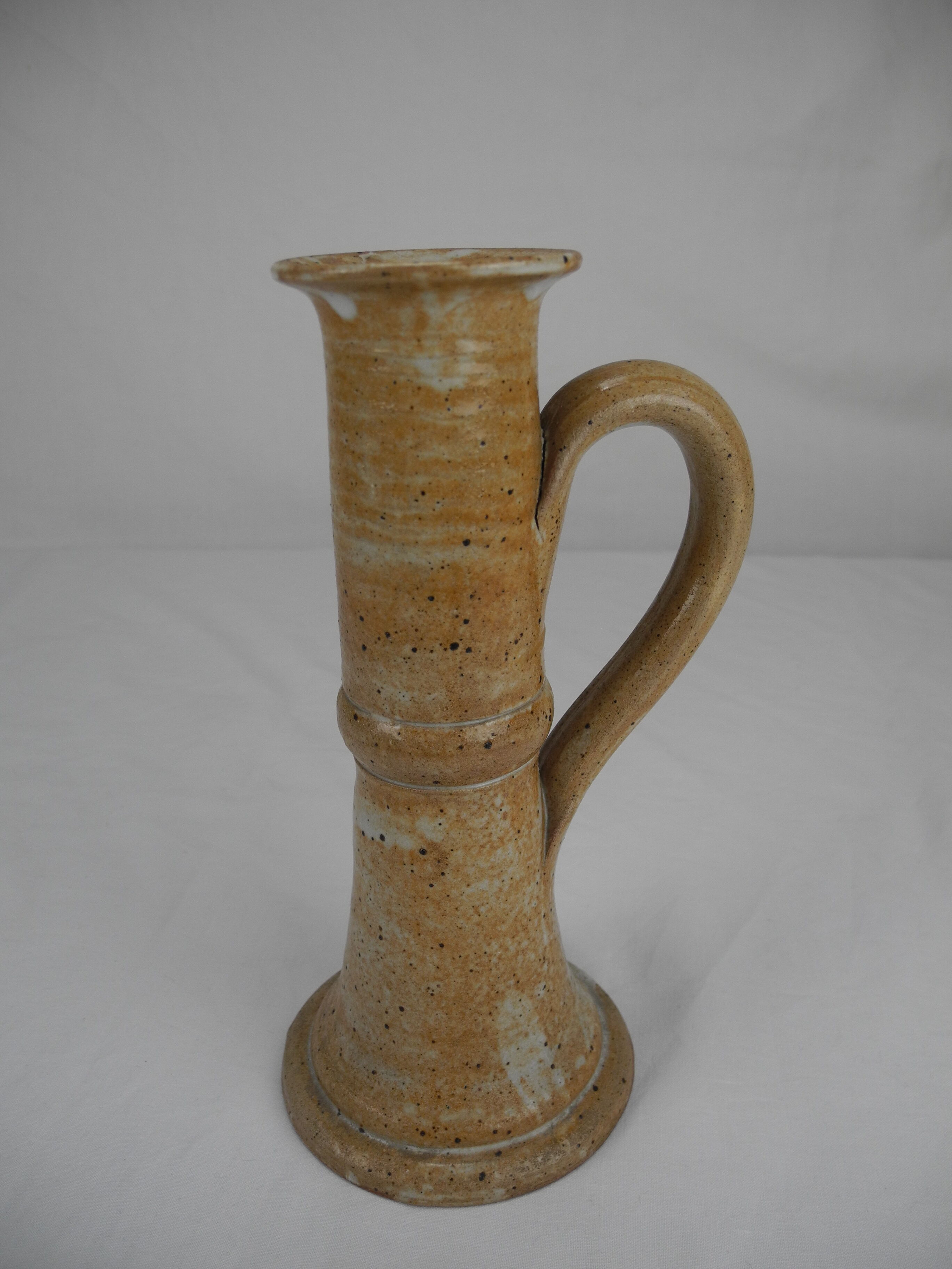 Old vintage stoneware candle holder