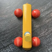 Vintage wooden pull toy, yellow car and small soldier.
