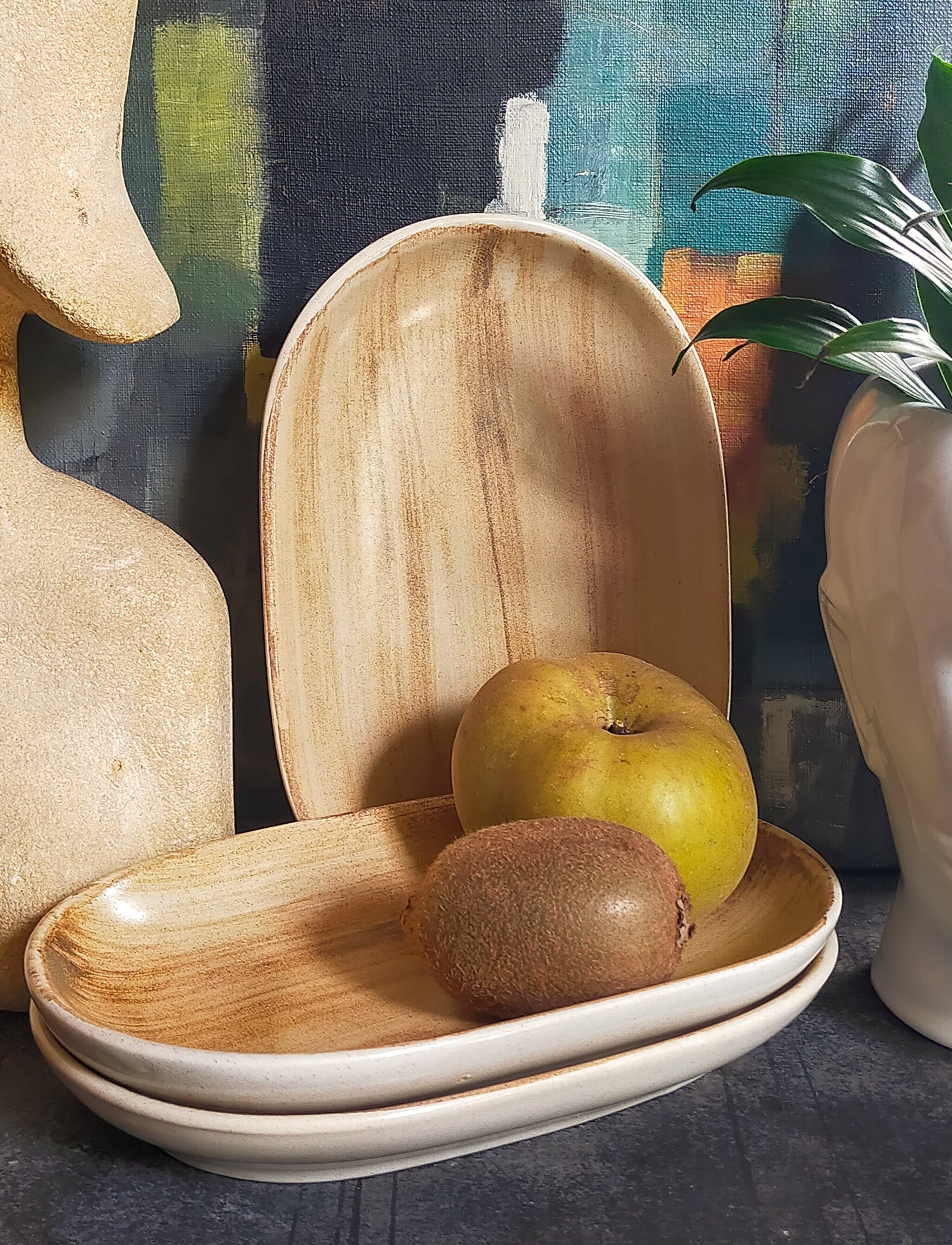 Three ceramic raviers decorated with vintage brushstrokes