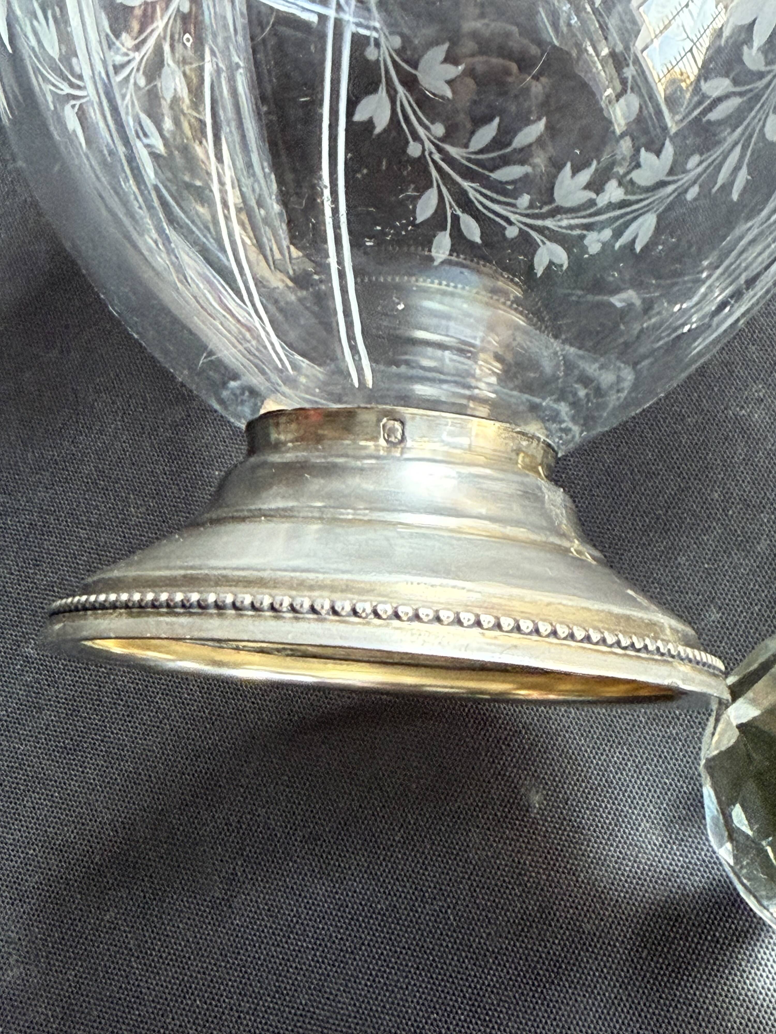 Cut crystal carafe with silver frame