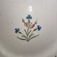 Old plate in earthenware of Nevers eighteenth Century with chantourné edges