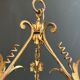 Important golden iron lantern with foliage decorations from the Baguès house.