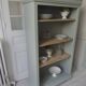 Louis Philippe style bookcase reenchanted in verdigris, 3 light oak waxed shelves.