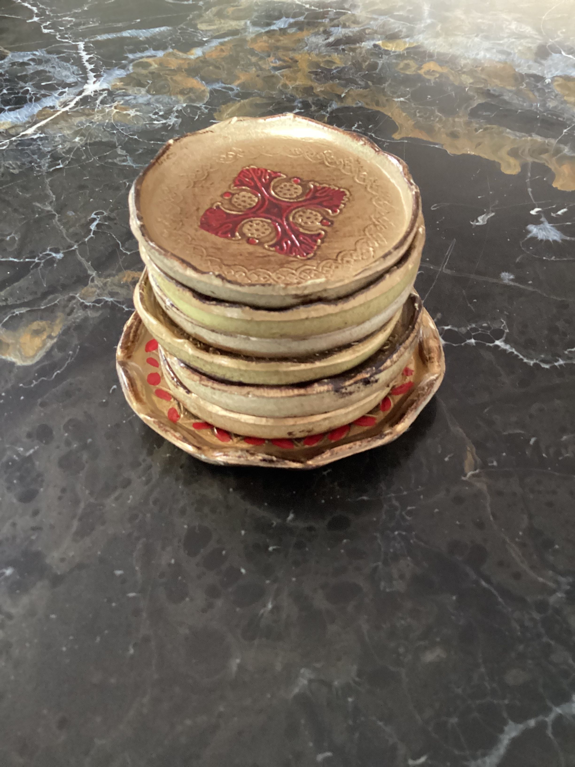 Set of six coasters with small plate
