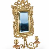 Pair of Napoleon III wall sconces in gilded bronze, with bevelled mirrors.