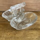 Salt and pepper shakers in glass