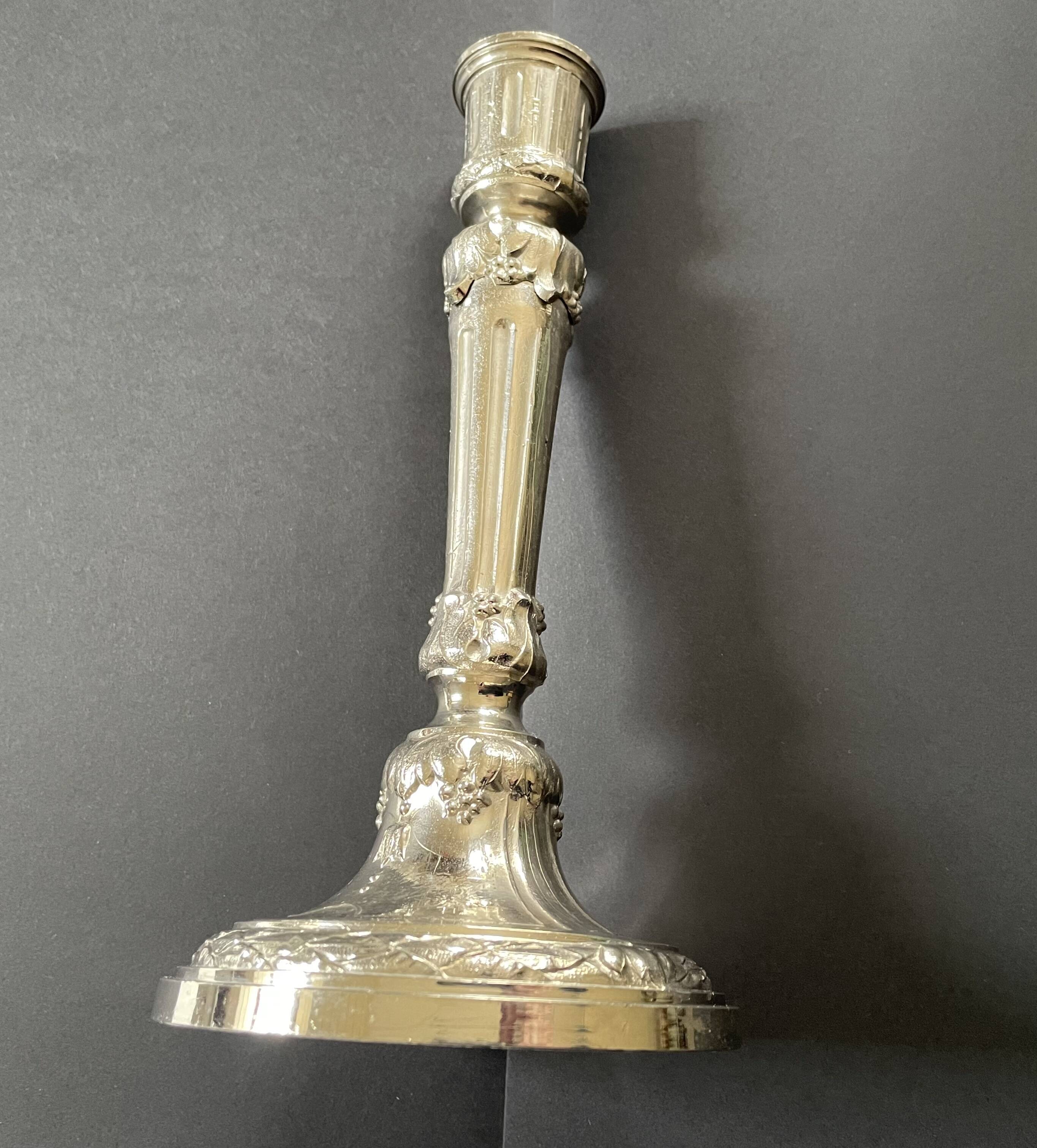 Antique silver-plated candlesticks in classic style