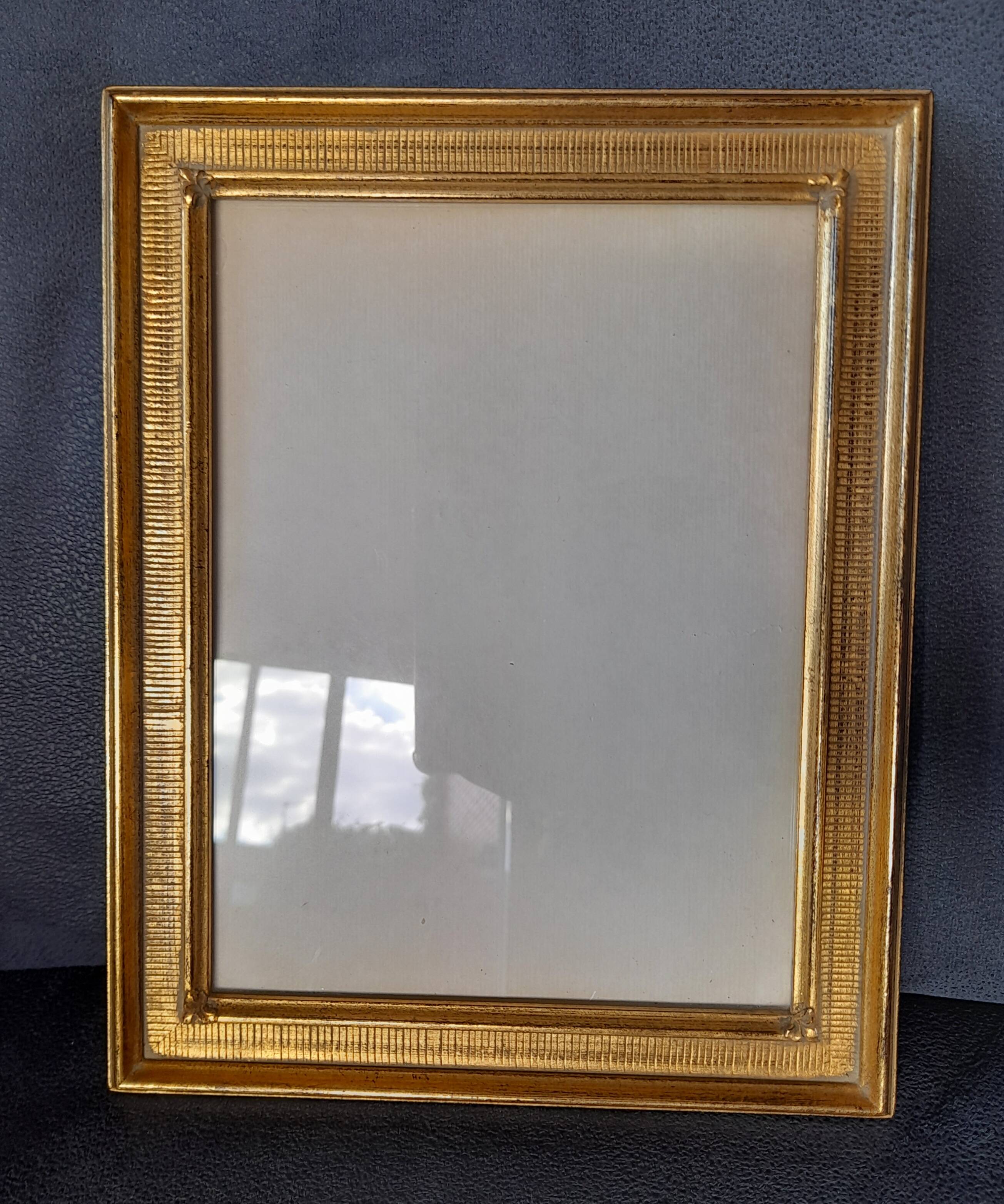 Antique frame with striated gilding