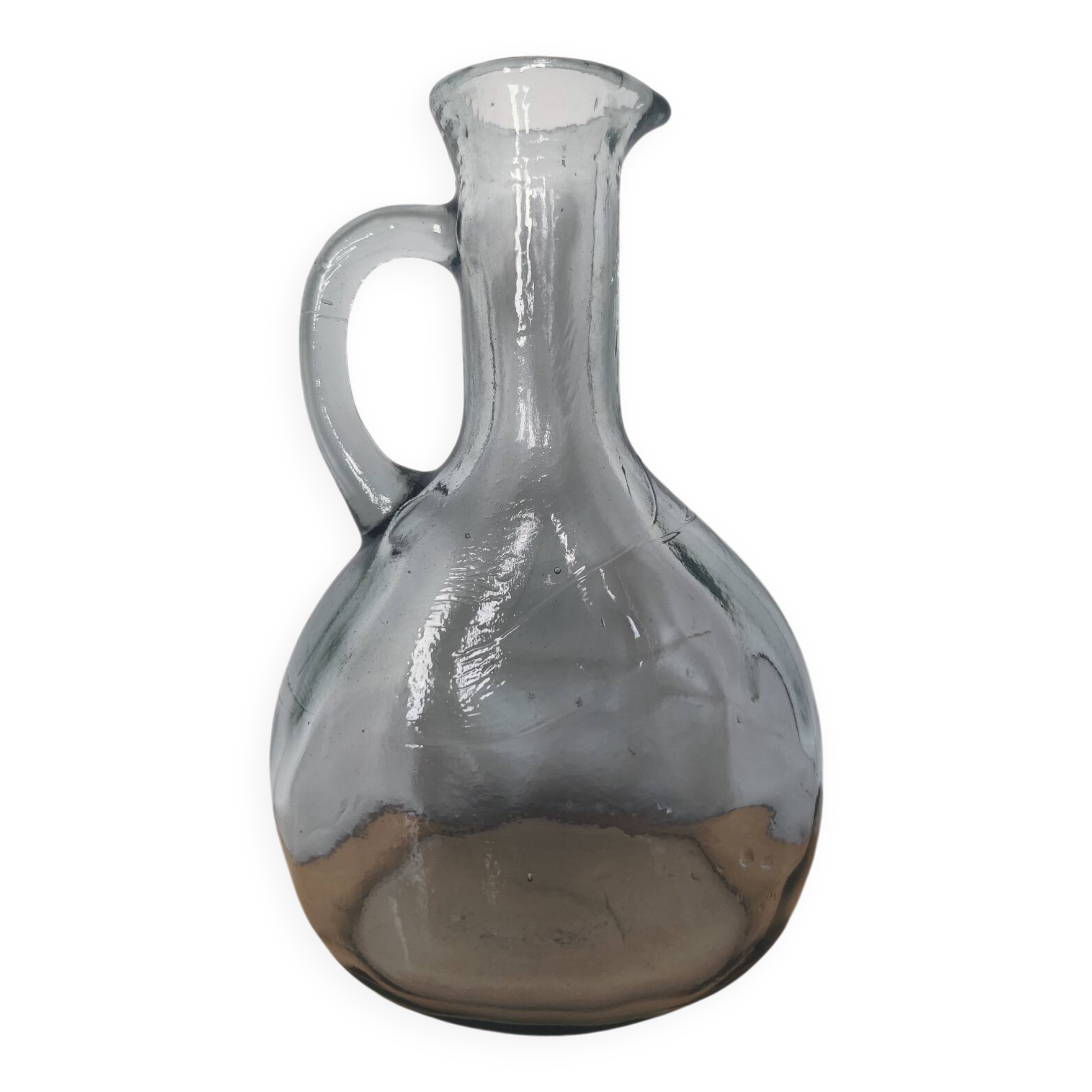 Antique carafe made of thick glass