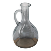 Antique carafe made of thick glass
