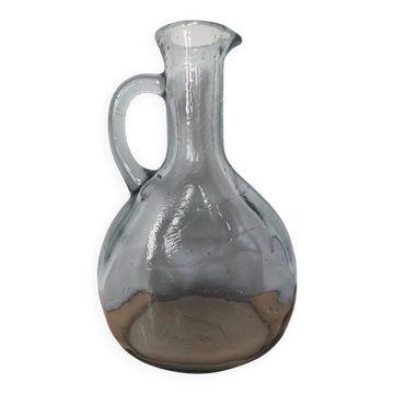 Antique carafe made of thick glass