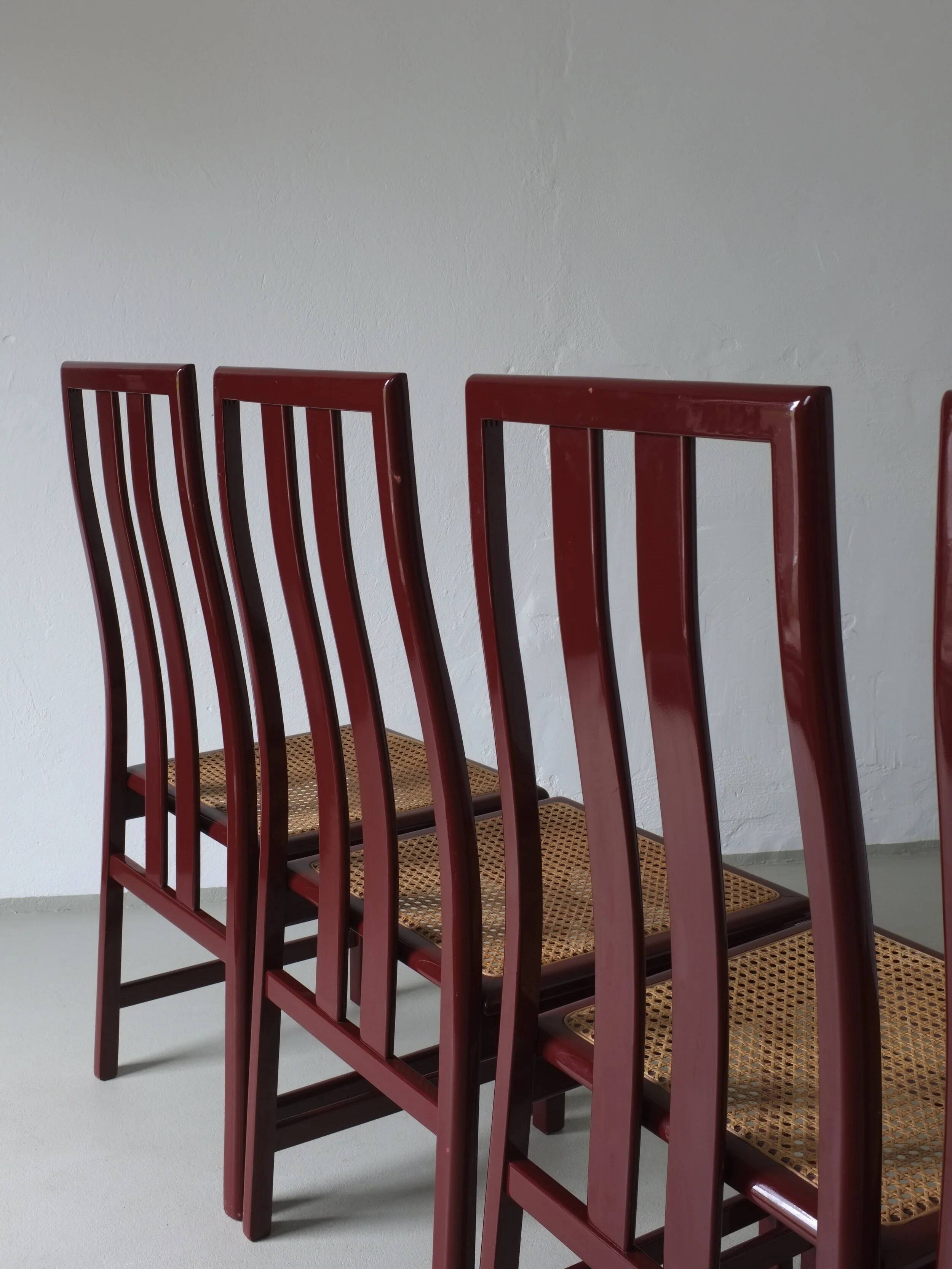 4 Glossy wine red cane seat chairs | Italy | 1970s