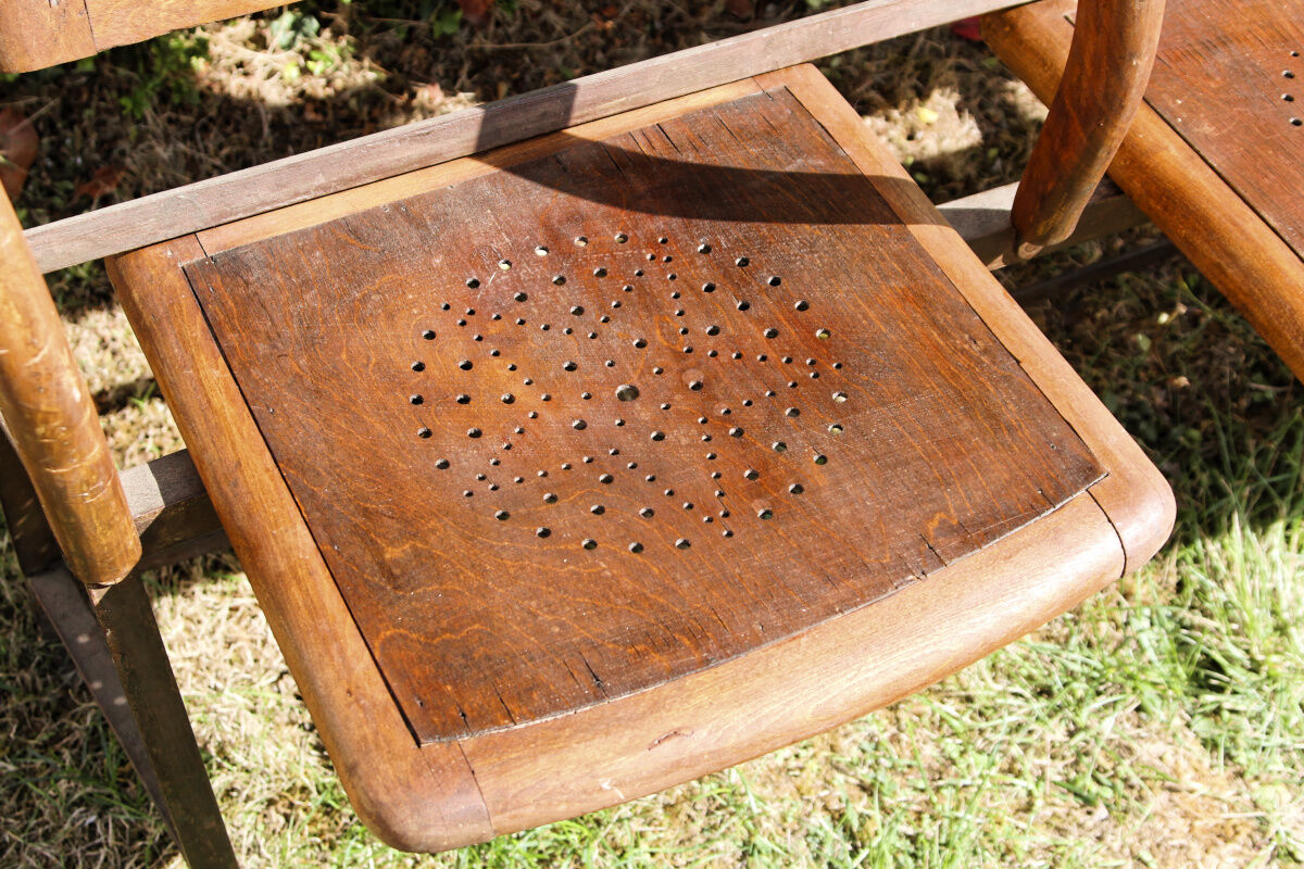 Row of theater folding seats, early twentieth century