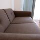 Tikamoon Bjorn sofa in solid oak and brown fabric, 2-seater.