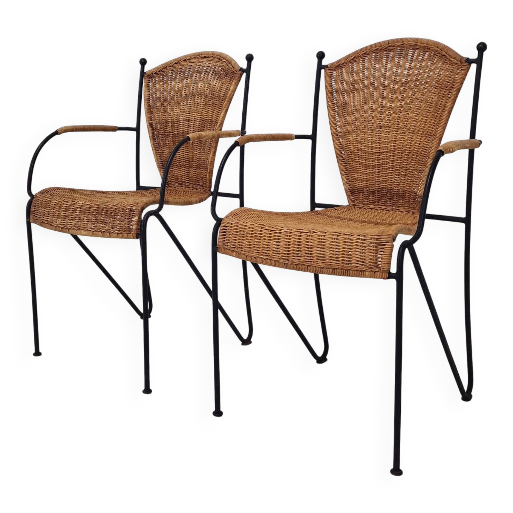 Pair of wicker and iron armchairs by Frederic Weinberg, United States, 1950s.