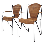 Pair of wicker and iron armchairs by Frederic Weinberg, United States, 1950s.