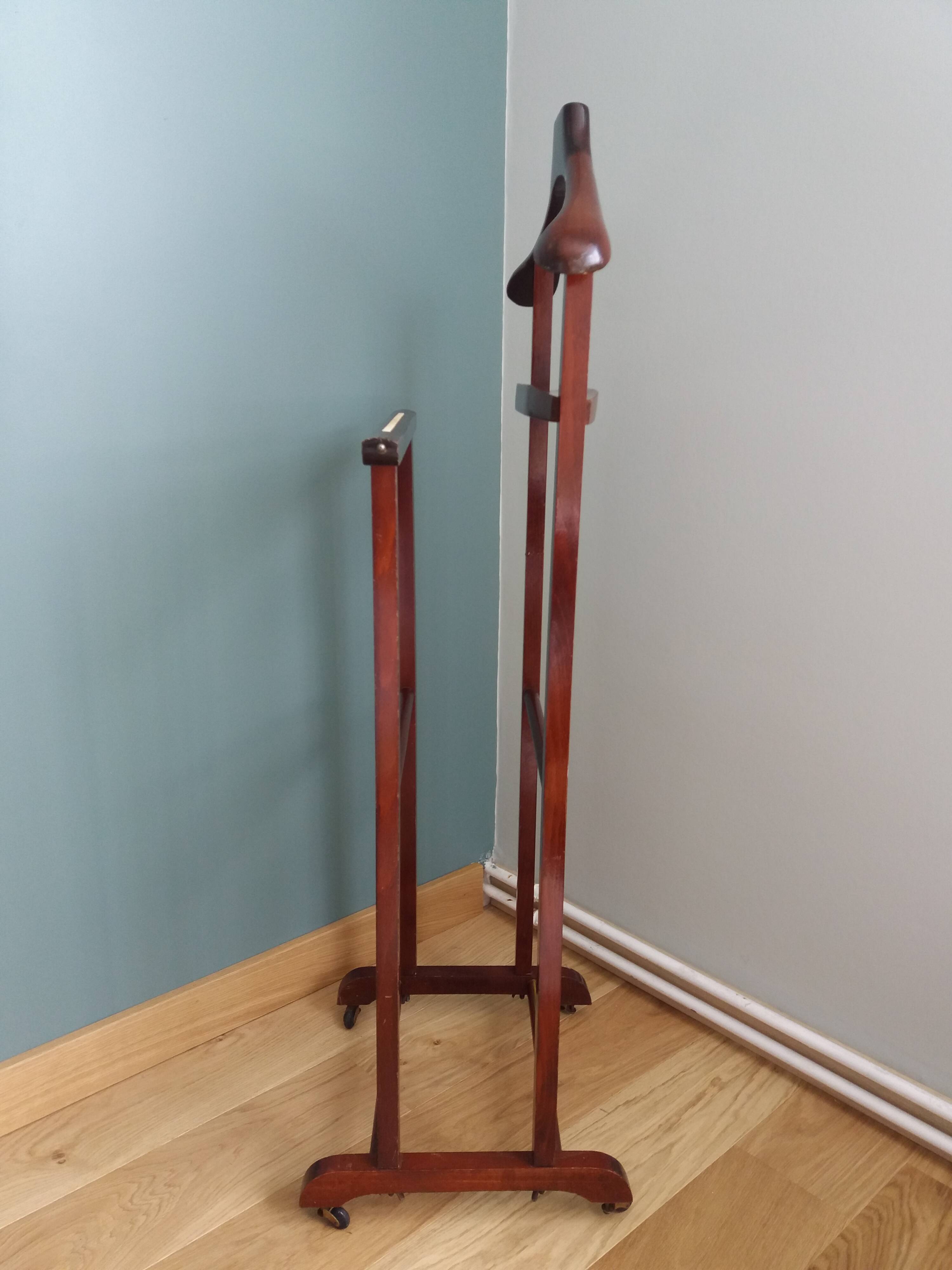 Night stand with two clothes racks