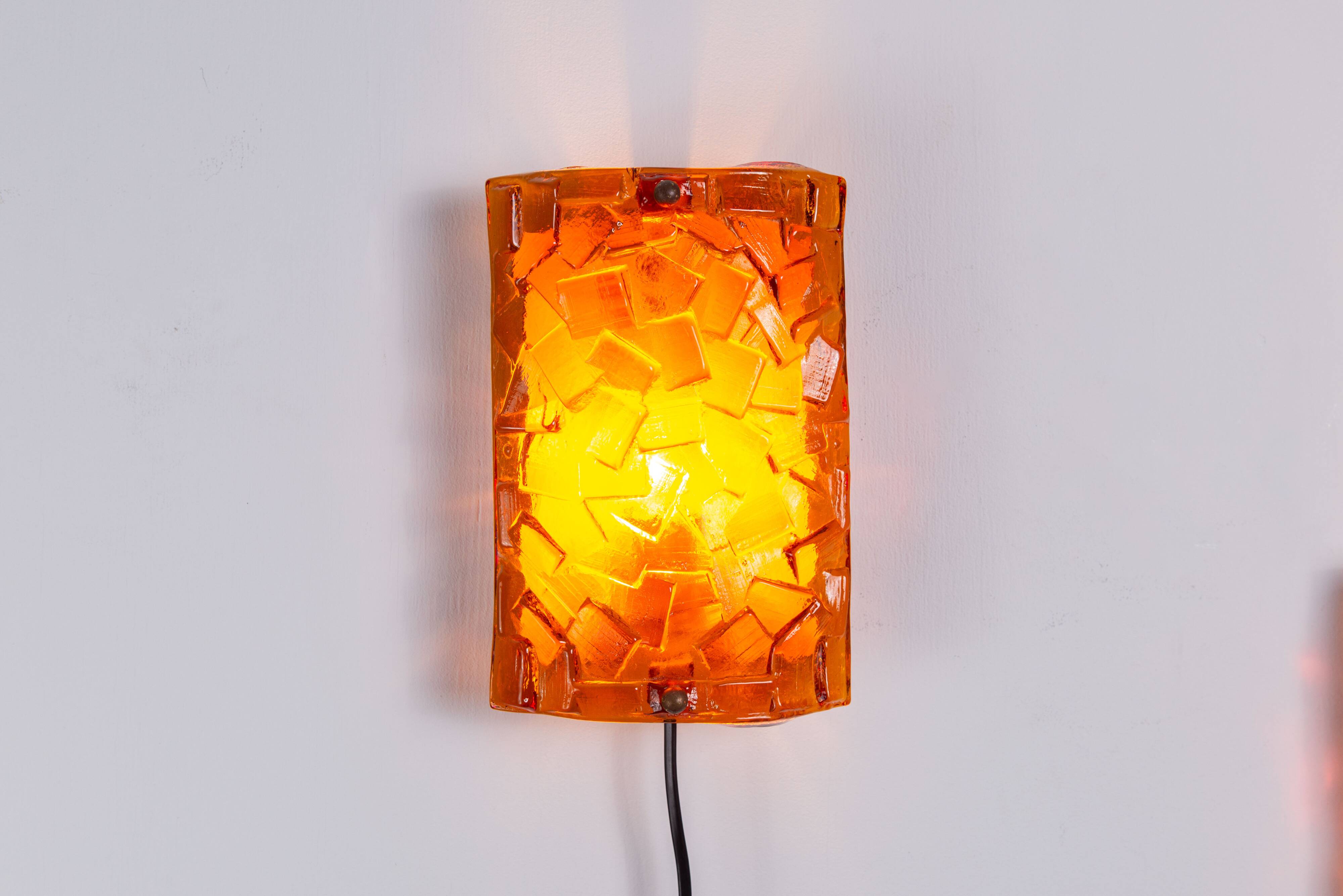 Vitrika Nybro amber coloured wall lamps