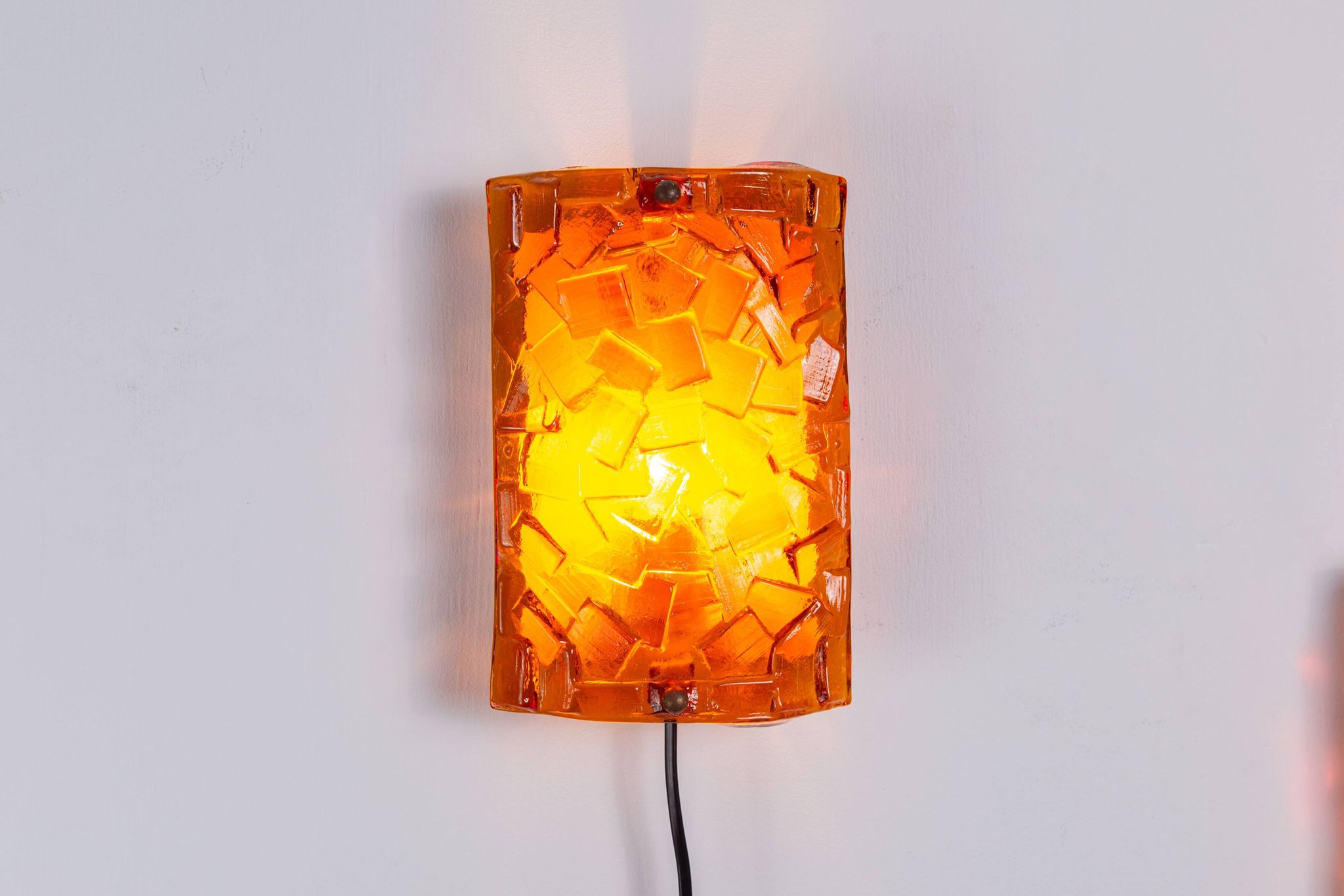 Vitrika Nybro amber coloured wall lamps