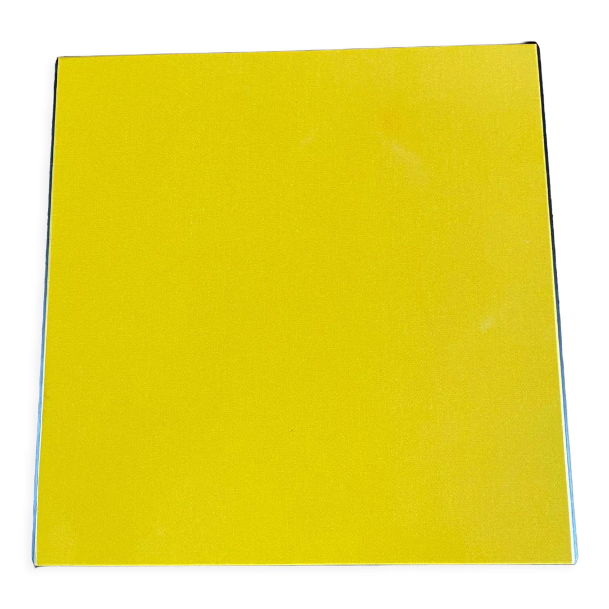 Dessous de plat en formica jaune vintage