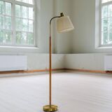 Mid-century brown leather and brass floor lamp, Falkenbergs Belysning, Sweden, 1960s.