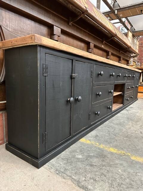 Old piece of furniture transformed into a TV stand