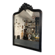 Miroir Napoléon III en bois noir à fronton