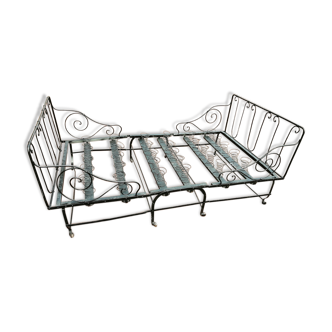 Folding bed in wrought iron