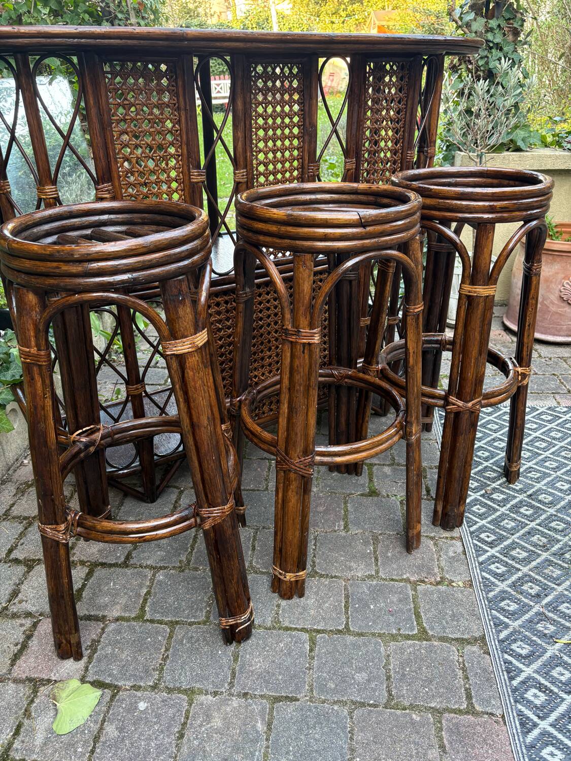 Rattan bar and vintage stools