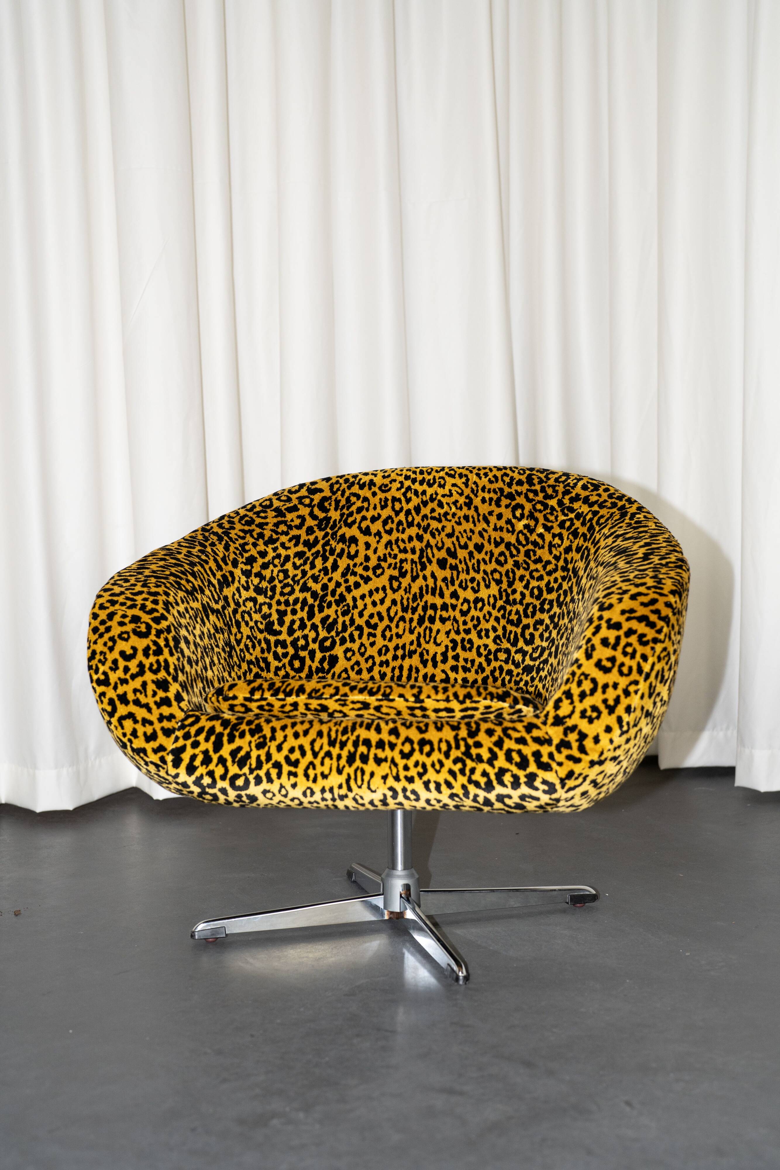 Vintage swivel shell armchair