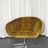 Vintage swivel shell armchair